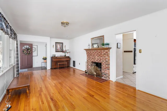 a close view of shower with a wooden wall
