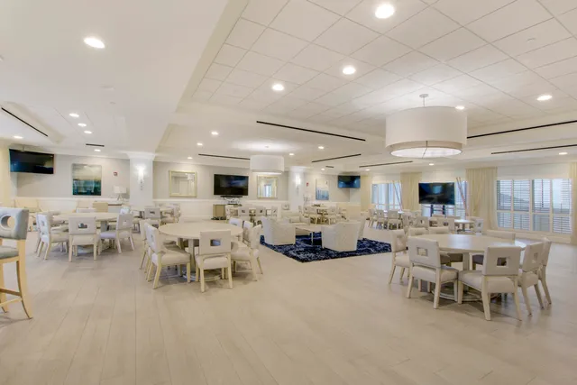 a large dining space with lots of furniture