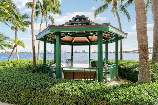 a view of a chairs and table in the garden