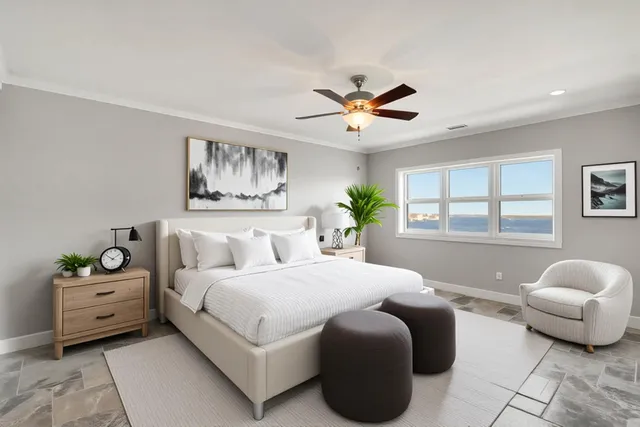 a bedroom with a bed and window