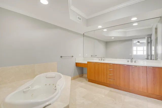 a bathroom with a bathtub sink and toilet