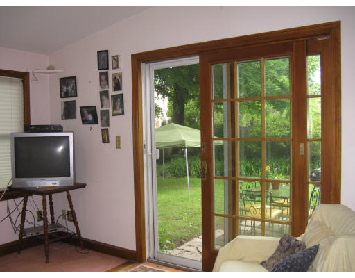 29 Sevinor Road Marblehead, MA 01945 - Photo 11 of 15 a living room with a floor to ceiling window and floor to ceiling window