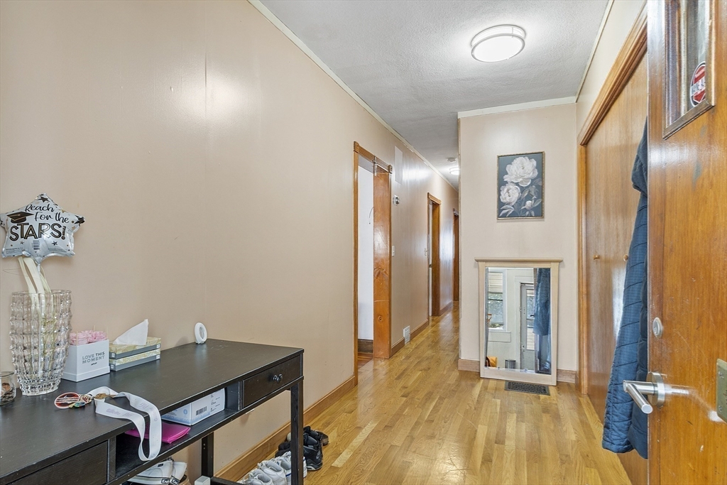 483 Broadway, Unit 1 Medford, MA 02155 - Photo 5 of 13 workspace with wooden floor