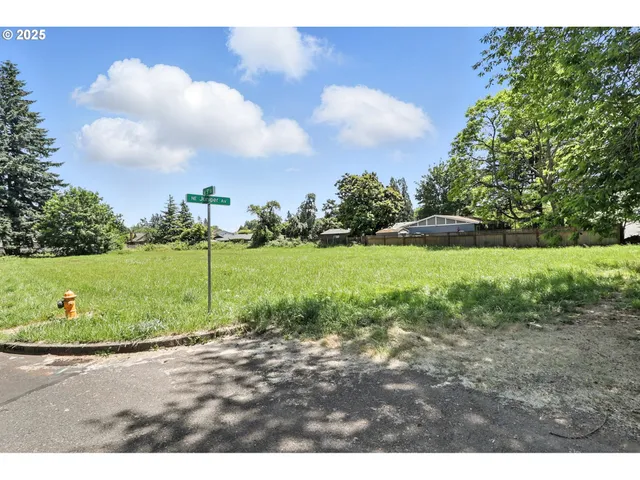 a view of a lake with a big yard