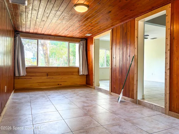 a view of front door with yard