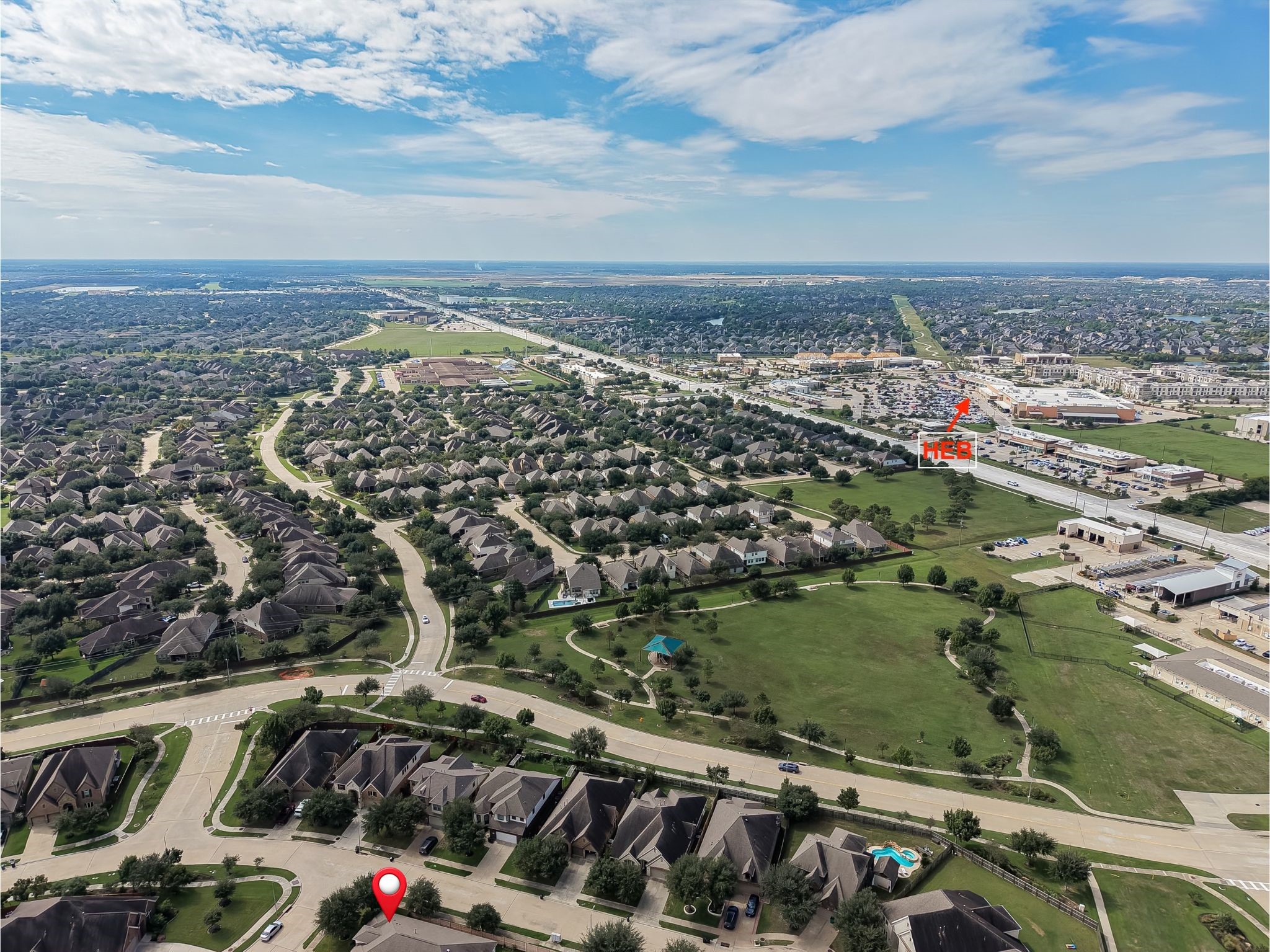 4314 Kent Ranch Court Katy, TX 77494 - Photo 47 of 49 Aerial view of the surrounding area, with an H-E-B grocery store close by.