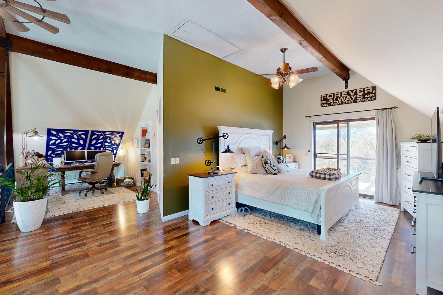 135 Sunny Hills Bangor, CA 95901 - Photo 14 of 35 a spacious bedroom with a bed couch and a window