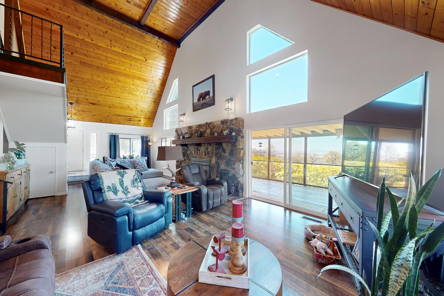 135 Sunny Hills Bangor, CA 95901 - Photo 18 of 35 a living room with fireplace furniture and a large window