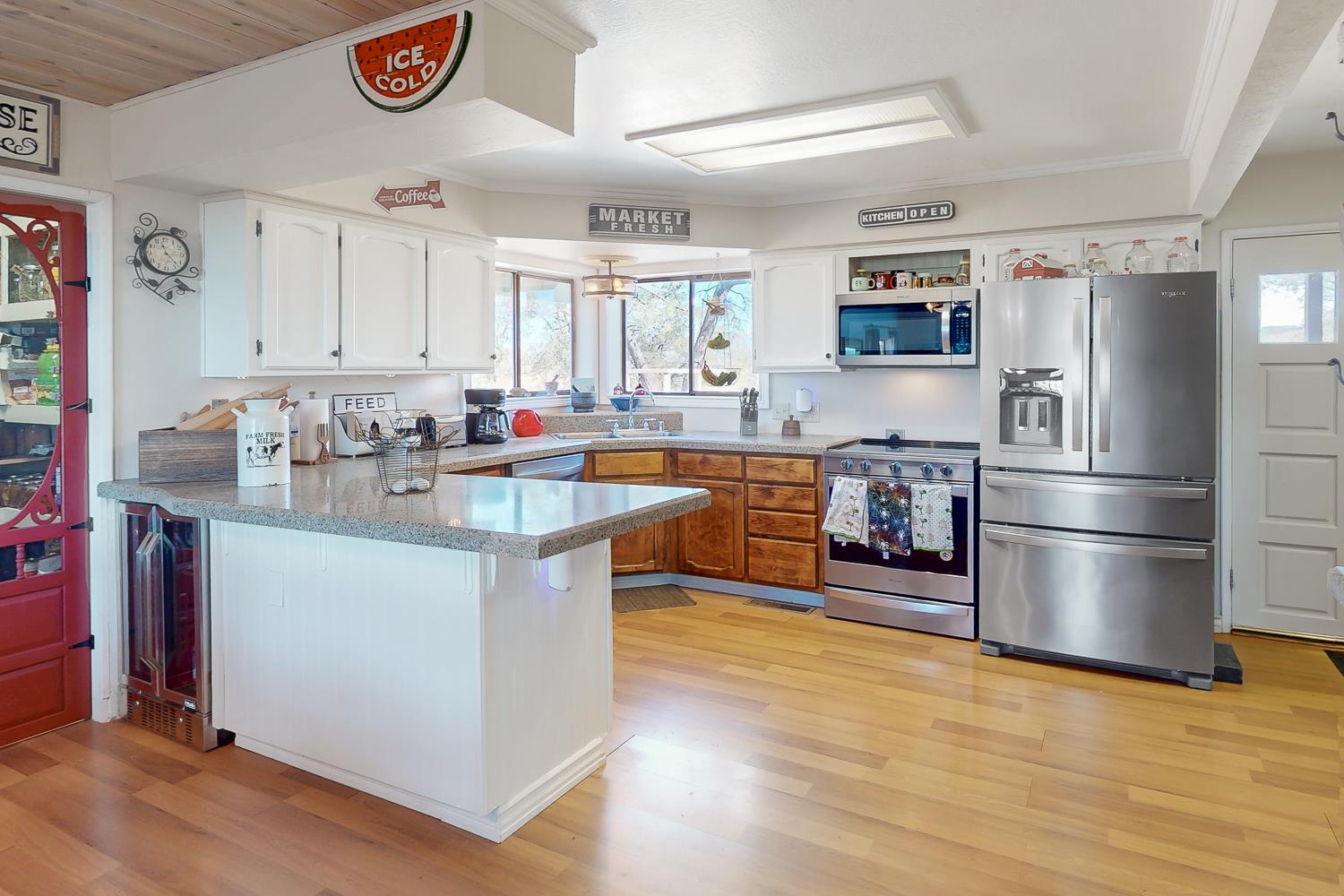 135 Sunny Hills Bangor, CA 95901 - Photo 7 of 35 a kitchen with stainless steel appliances granite countertop a sink stove and refrigerator