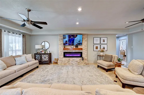 a living room with furniture and window