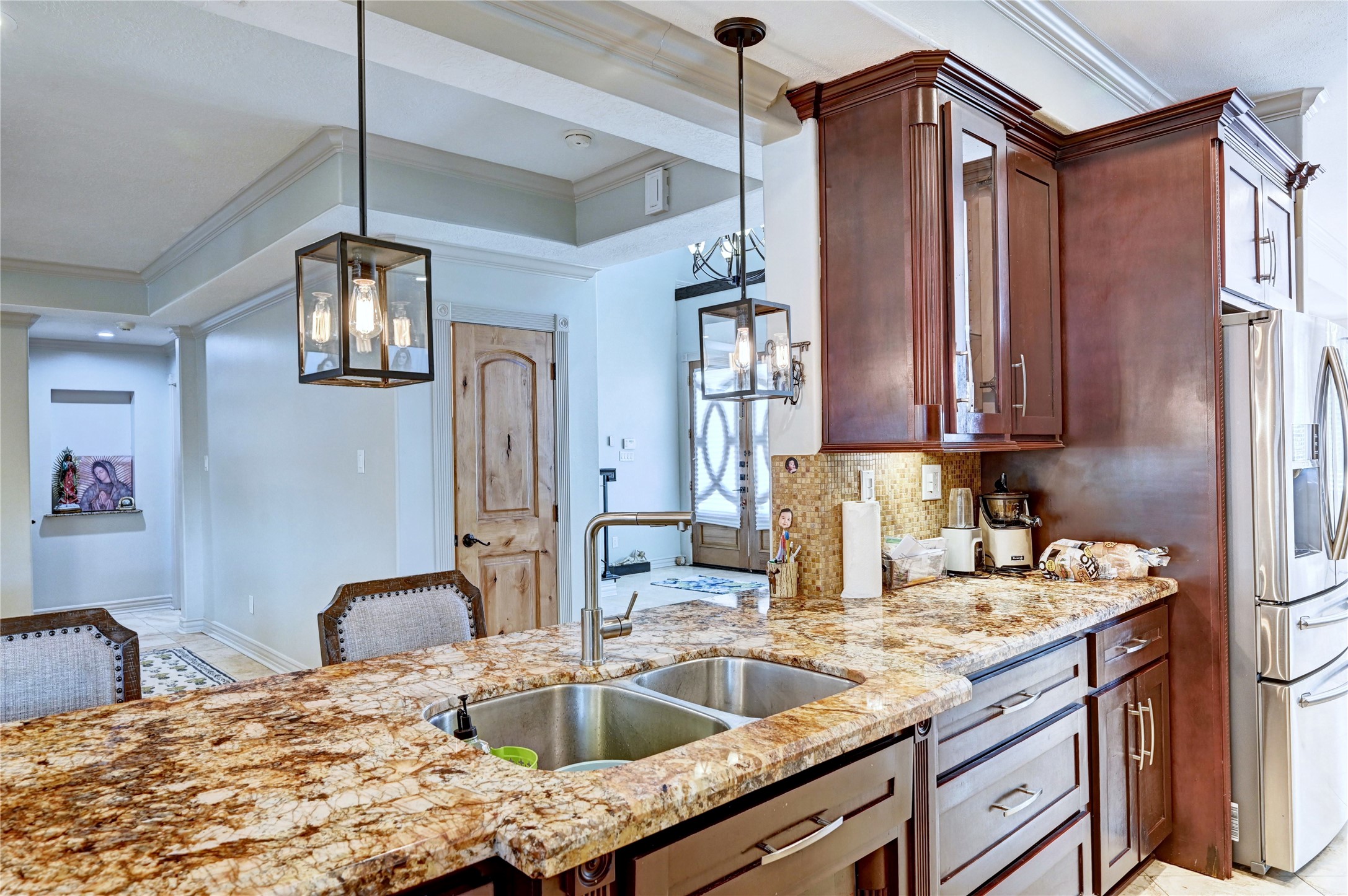 2012 Forest Hill Boulevard Houston, TX 77023 - Photo 15 of 50 a kitchen with stainless steel appliances granite countertop a sink refrigerator and microwave