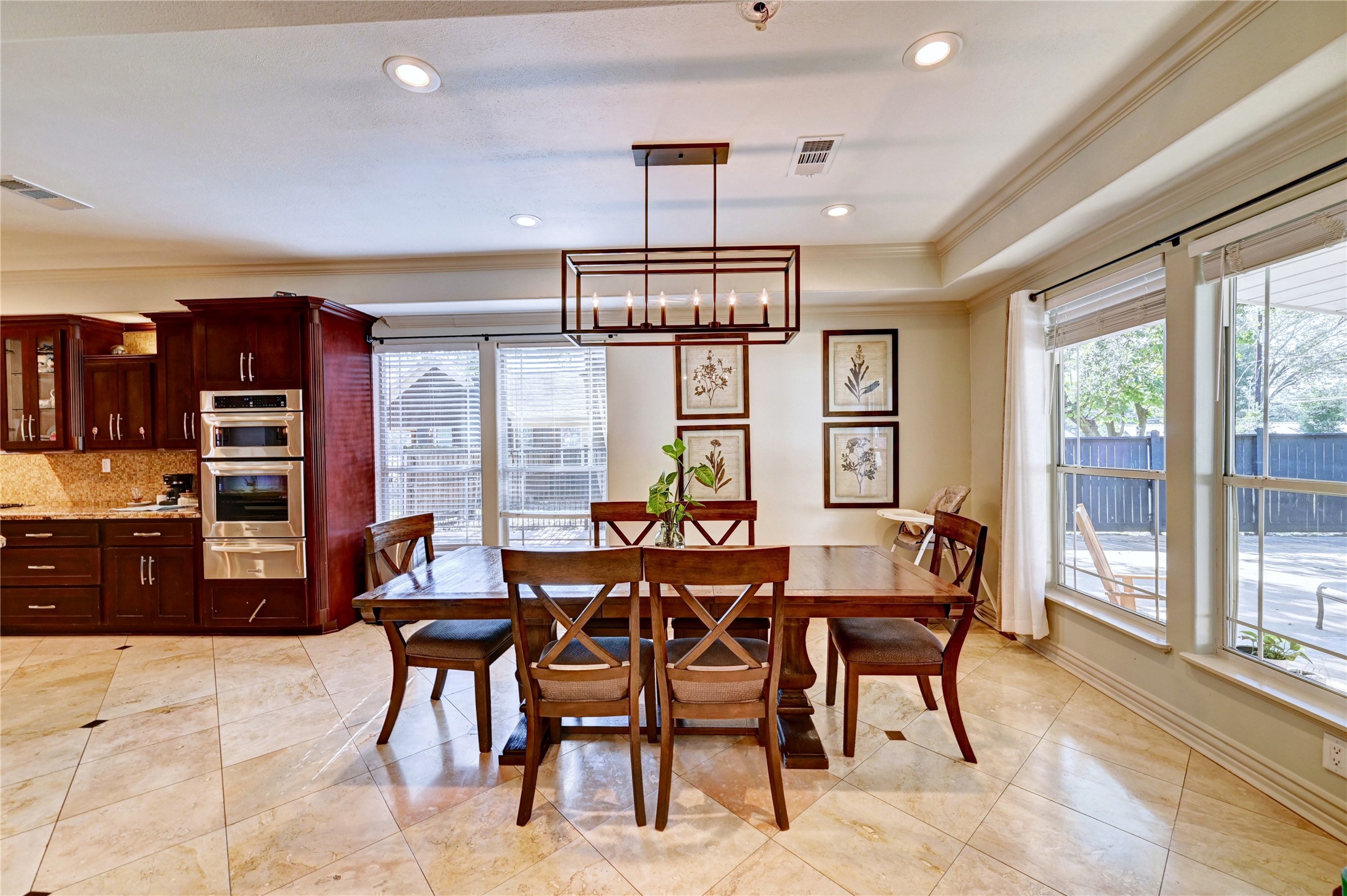 2012 Forest Hill Boulevard Houston, TX 77023 - Photo 17 of 50 a view of a dining room with furniture window and outside view