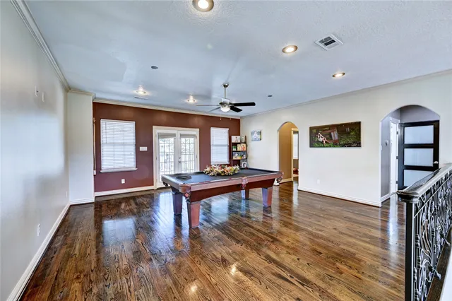 a living room with furniture a rug and a large window