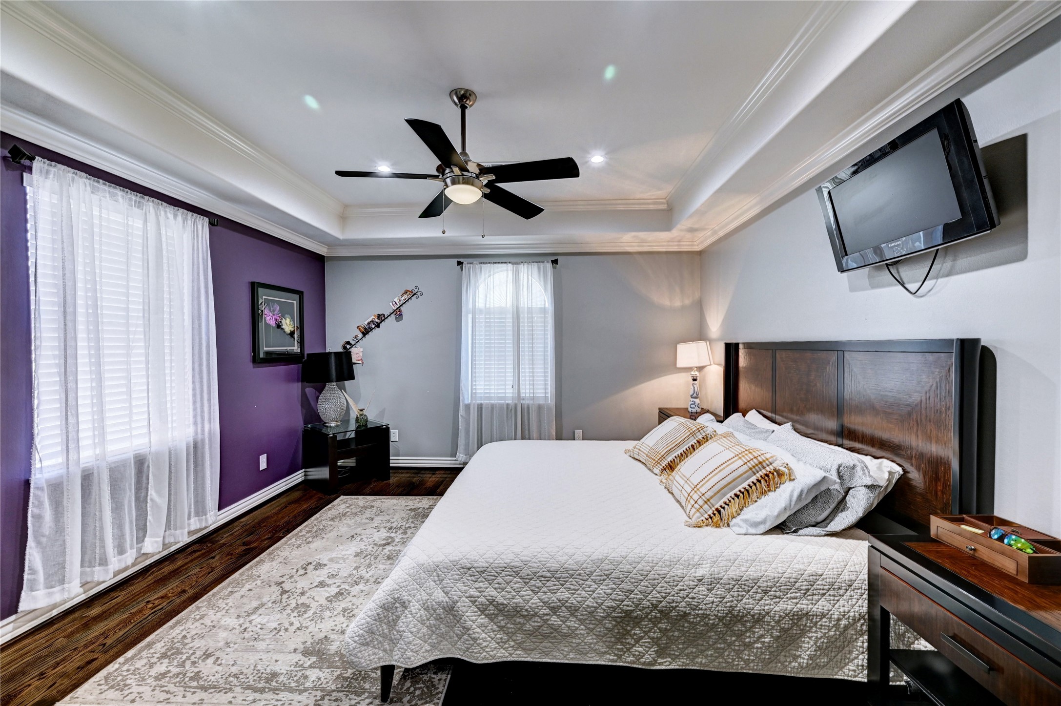 2012 Forest Hill Boulevard Houston, TX 77023 - Photo 22 of 50 a bedroom with a bed and a flat screen tv