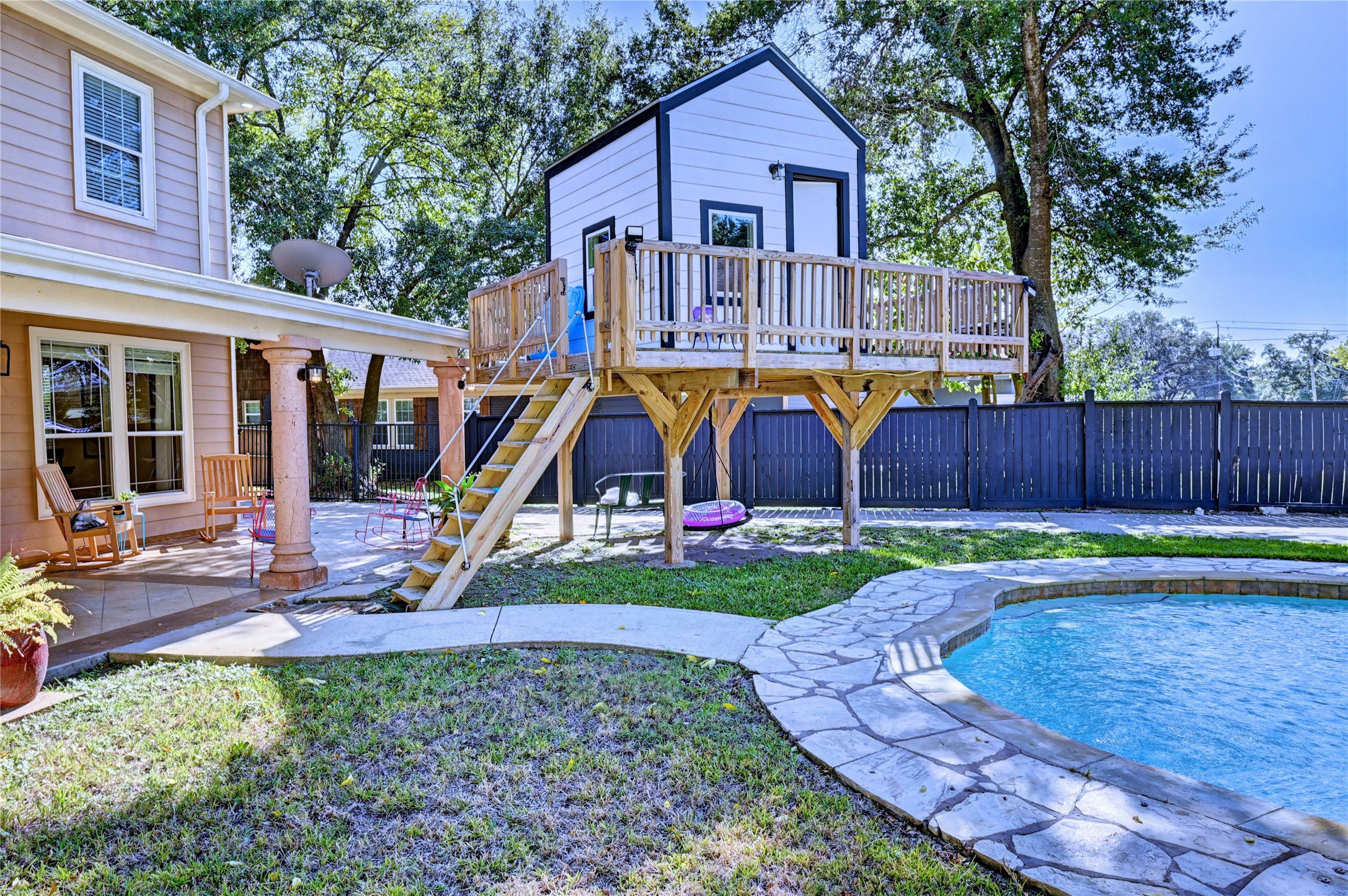 2012 Forest Hill Boulevard Houston, TX 77023 - Photo 33 of 50 a view of a house with backyard and a slide