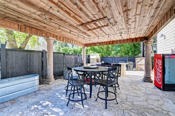 a view of outdoor sitting area with furniture