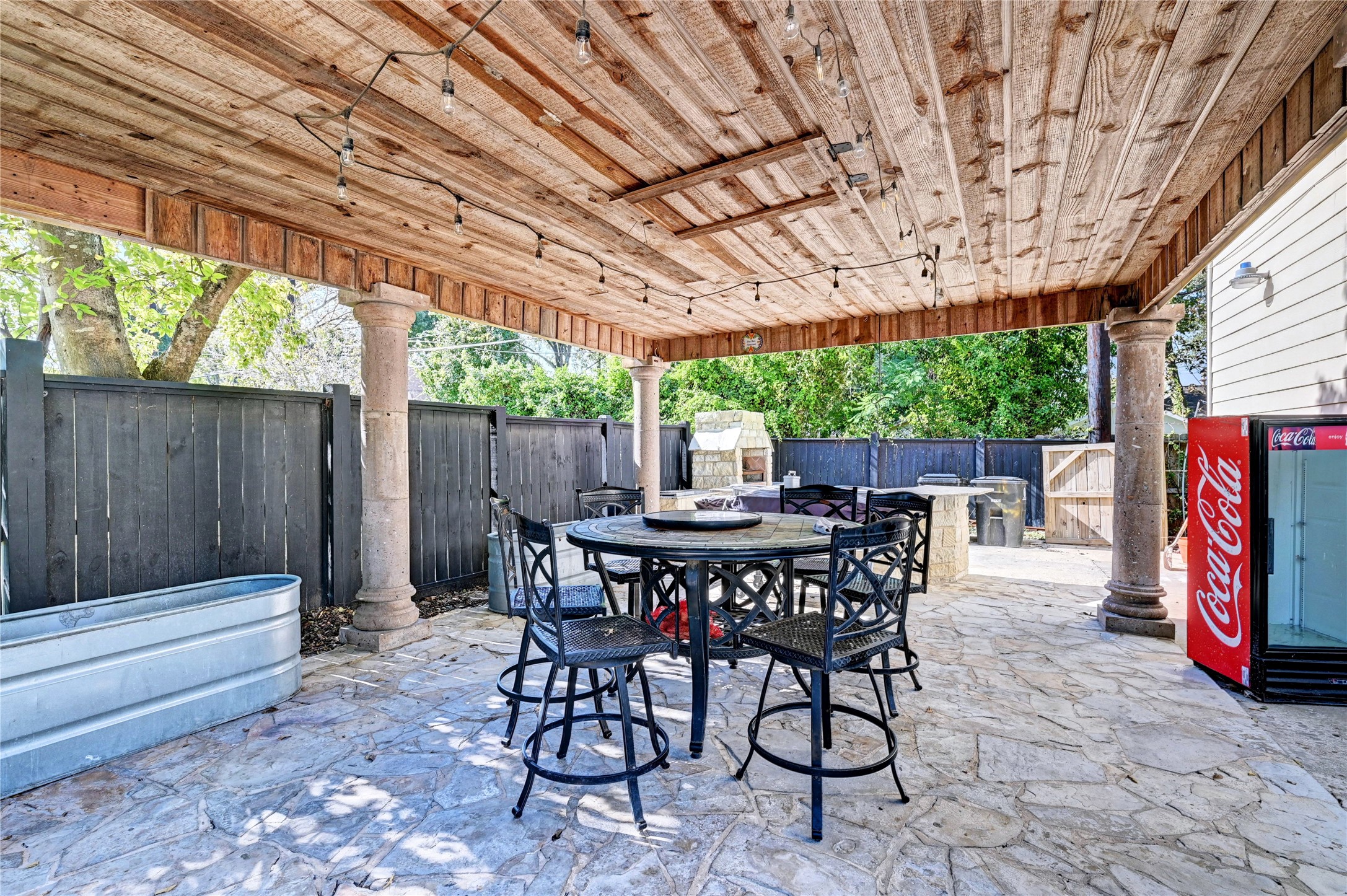 2012 Forest Hill Boulevard Houston, TX 77023 - Photo 39 of 50 a view of an outdoor dining space with a table and chairs