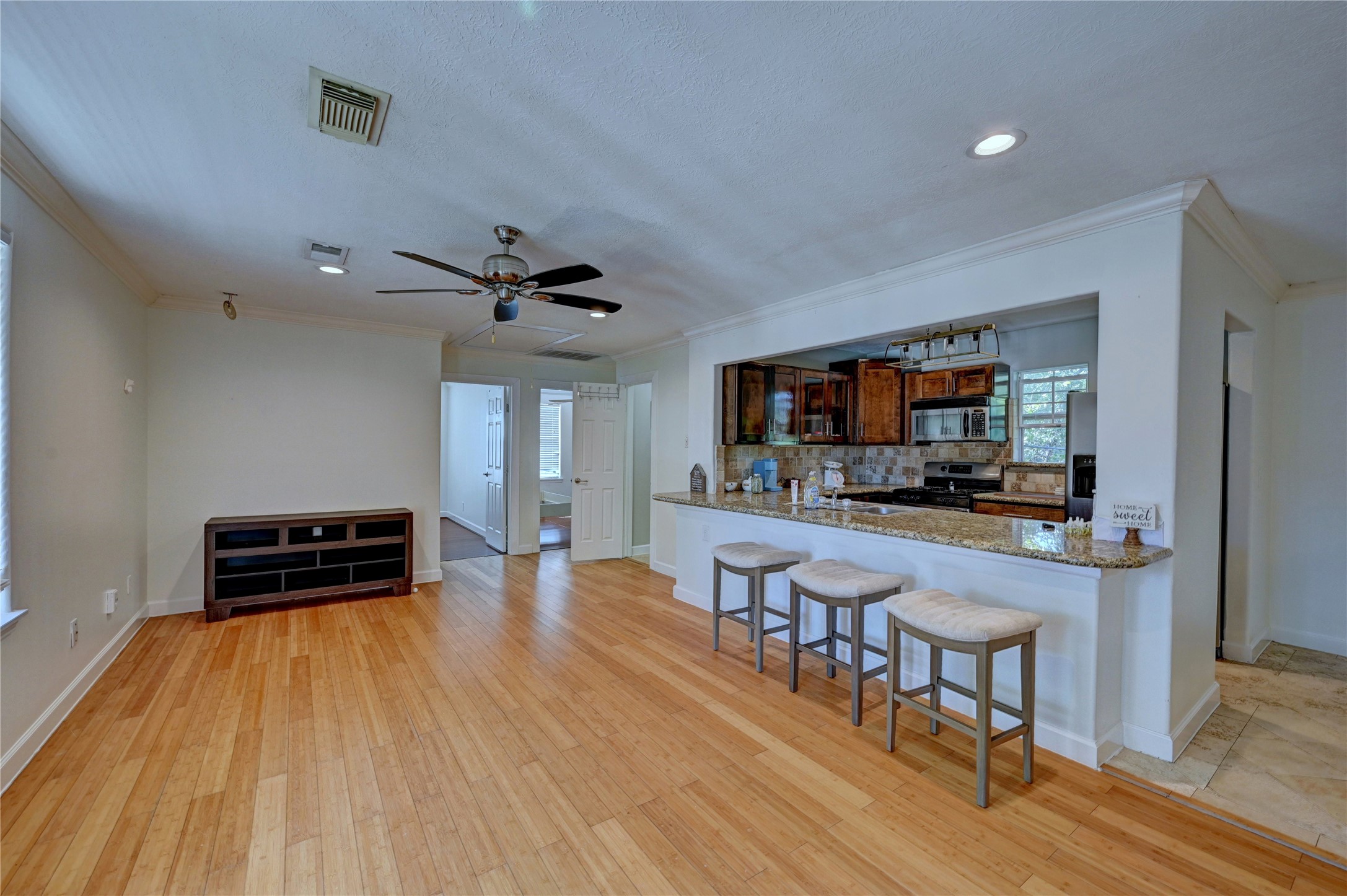 2012 Forest Hill Boulevard Houston, TX 77023 - Photo 43 of 50 a living room with furniture and a flat screen tv