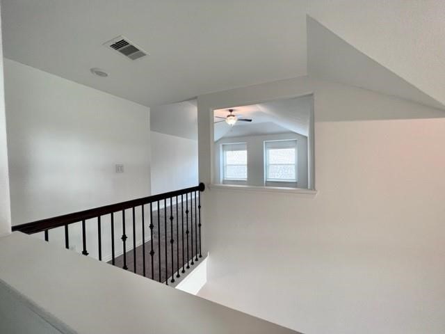 4826 Albany Ridge Lane Rosharon, TX 77583 - Photo 25 of 37 a view of a hallway with windows