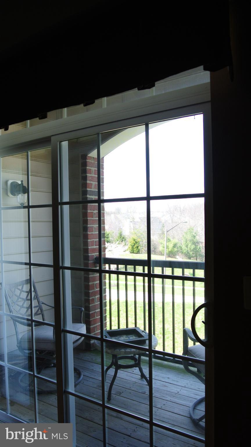 7305 Maplecrest Road, Unit 204 Elkridge, MD 21075 - Photo 15 of 30 Sliding Door Leading to Balcony