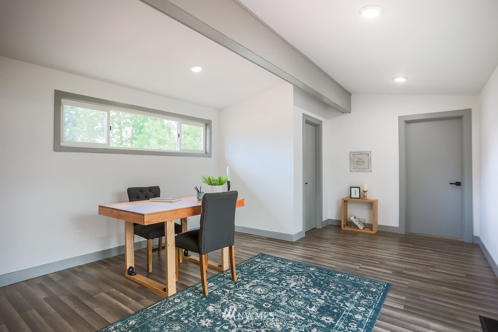 10910 Southeast 181st Street Renton, WA 98055 - Photo 23 of 32 a view of a dining room with a table and chairs