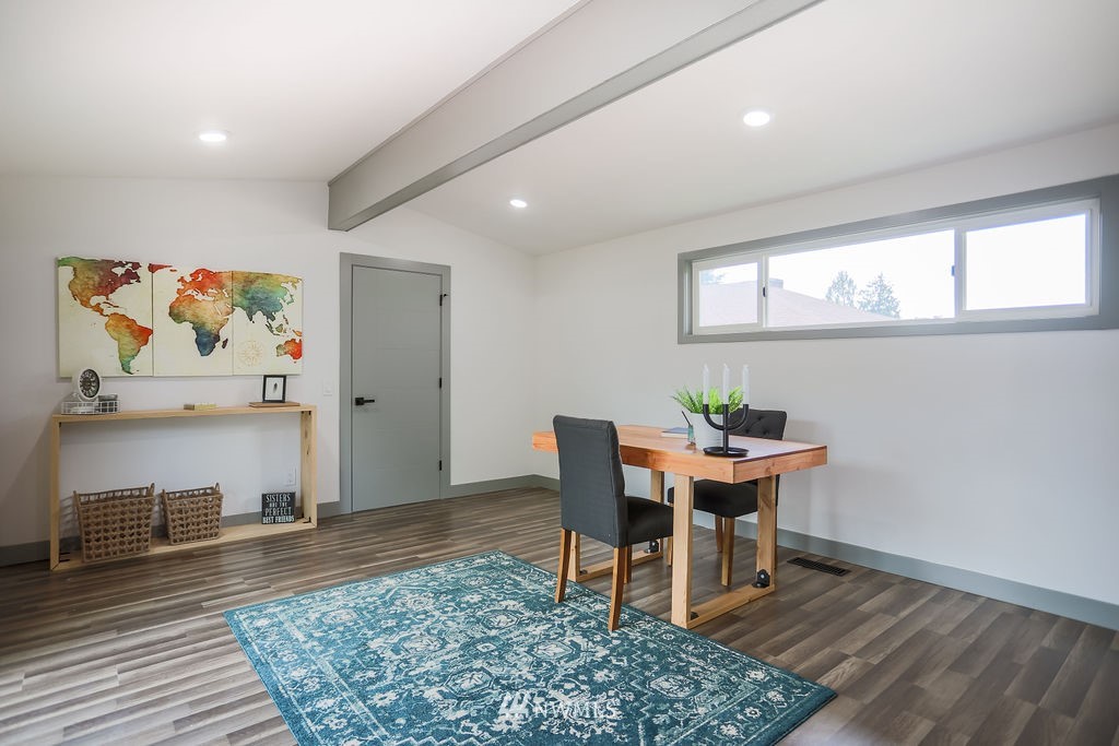 10910 Southeast 181st Street Renton, WA 98055 - Photo 24 of 32 a workspace with furniture window and wooden floor