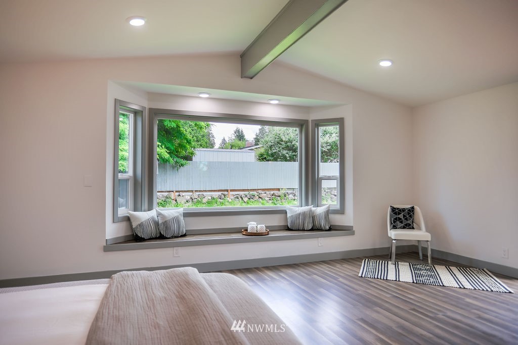 10910 Southeast 181st Street Renton, WA 98055 - Photo 28 of 32 a bedroom with furniture and a large window