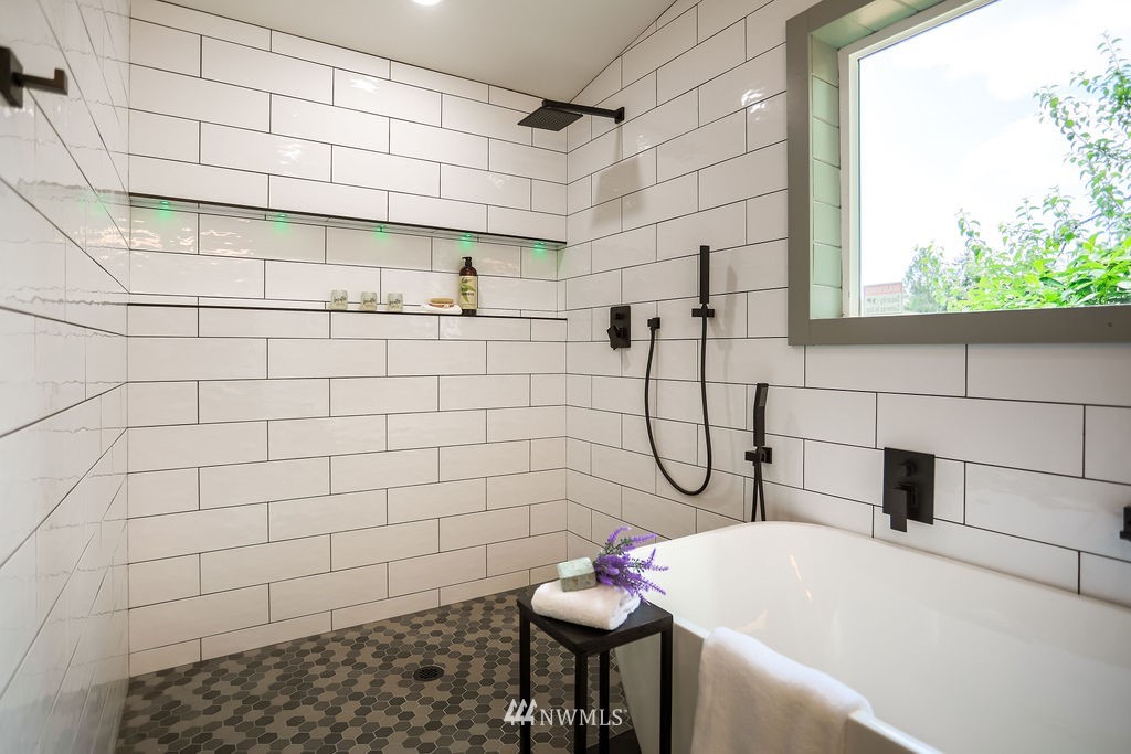 10910 Southeast 181st Street Renton, WA 98055 - Photo 31 of 32 a bathroom with a shower