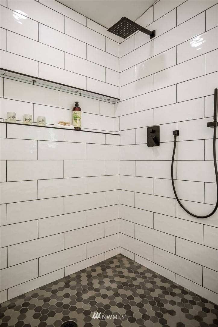 10910 Southeast 181st Street Renton, WA 98055 - Photo 32 of 32 a bathroom with a shower