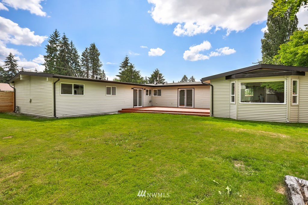 10910 Southeast 181st Street Renton, WA 98055 - Photo 5 of 32 a view of a house with a backyard