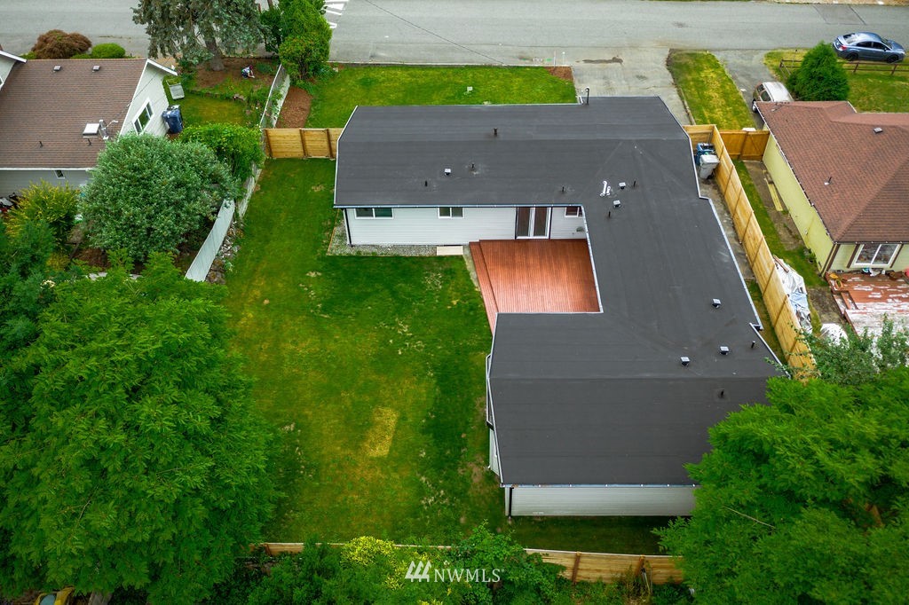 10910 Southeast 181st Street Renton, WA 98055 - Photo 7 of 32 an aerial view of residential house with outdoor space and a lake view