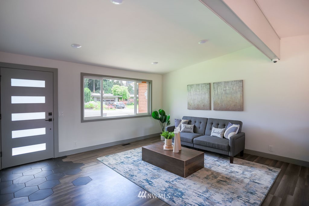 10910 Southeast 181st Street Renton, WA 98055 - Photo 9 of 32 a living room with furniture and a window