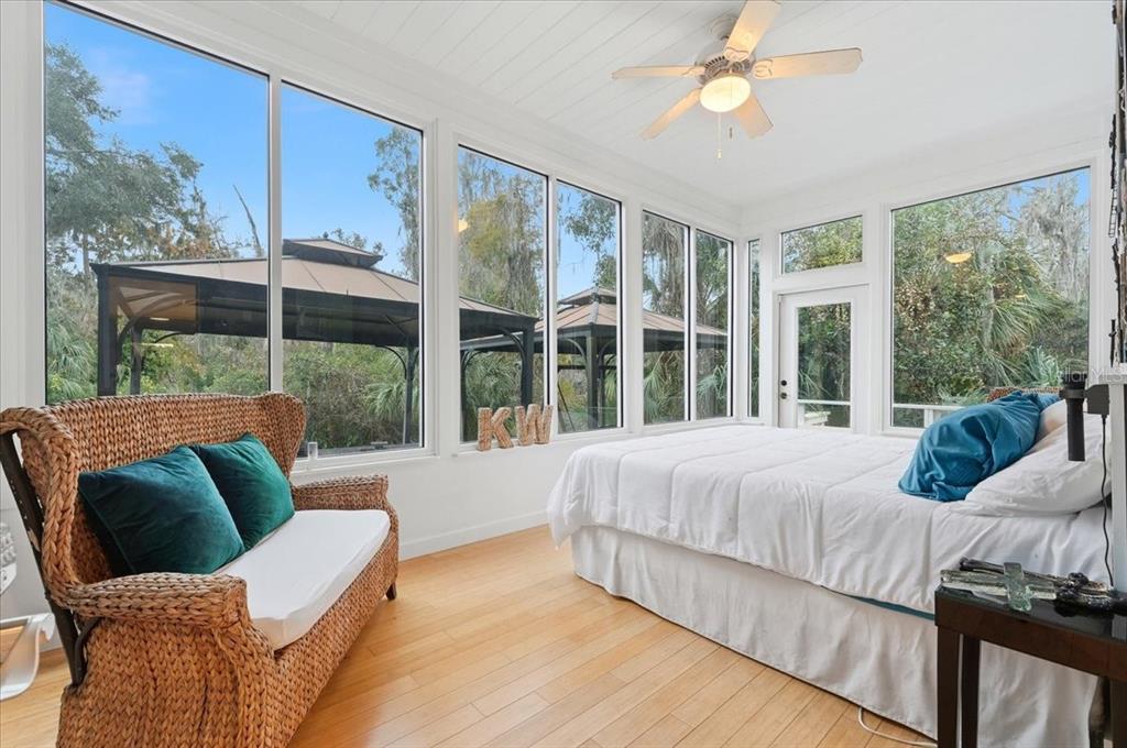 4703 Rambling River Road Brandon, FL 33511 - Photo 20 of 62 a bedroom with a bed and a large window