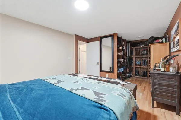 a dining room with furniture window and wooden floor