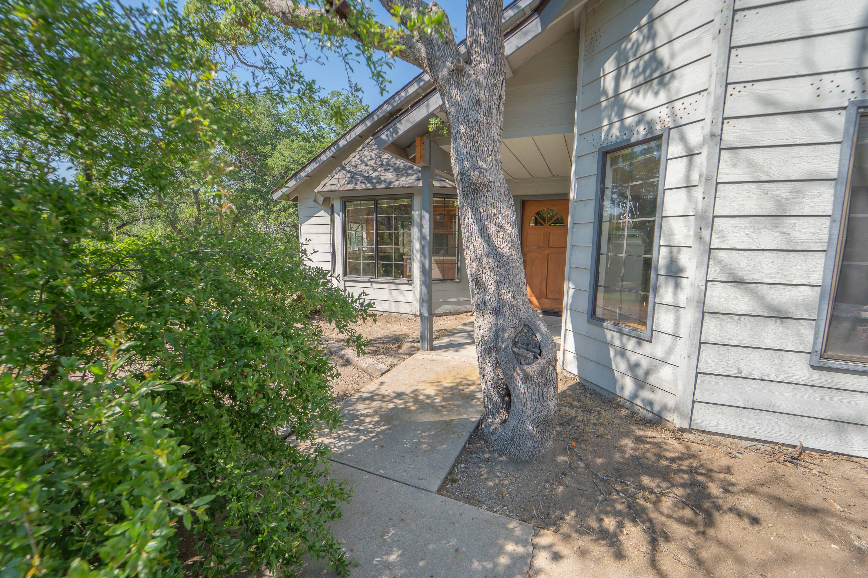 40962 Oak Ridge Drive Three Rivers, CA 93271 - Photo 7 of 36 a view of a house with a tree