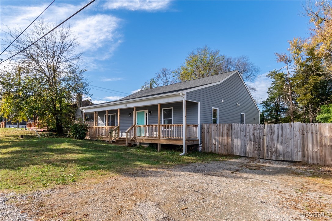 4436 Angus Road Richmond, VA 23234 - Photo 4 of 24 View of front facade with a porch and a front yard