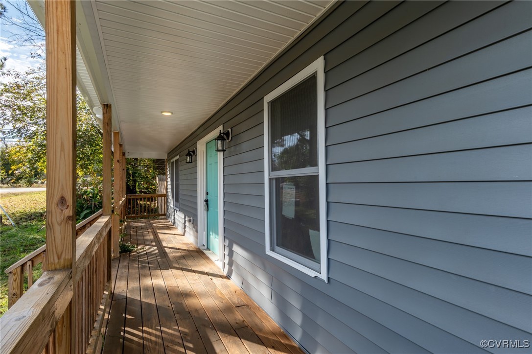 4436 Angus Road Richmond, VA 23234 - Photo 8 of 24 Wooden terrace featuring covered porch