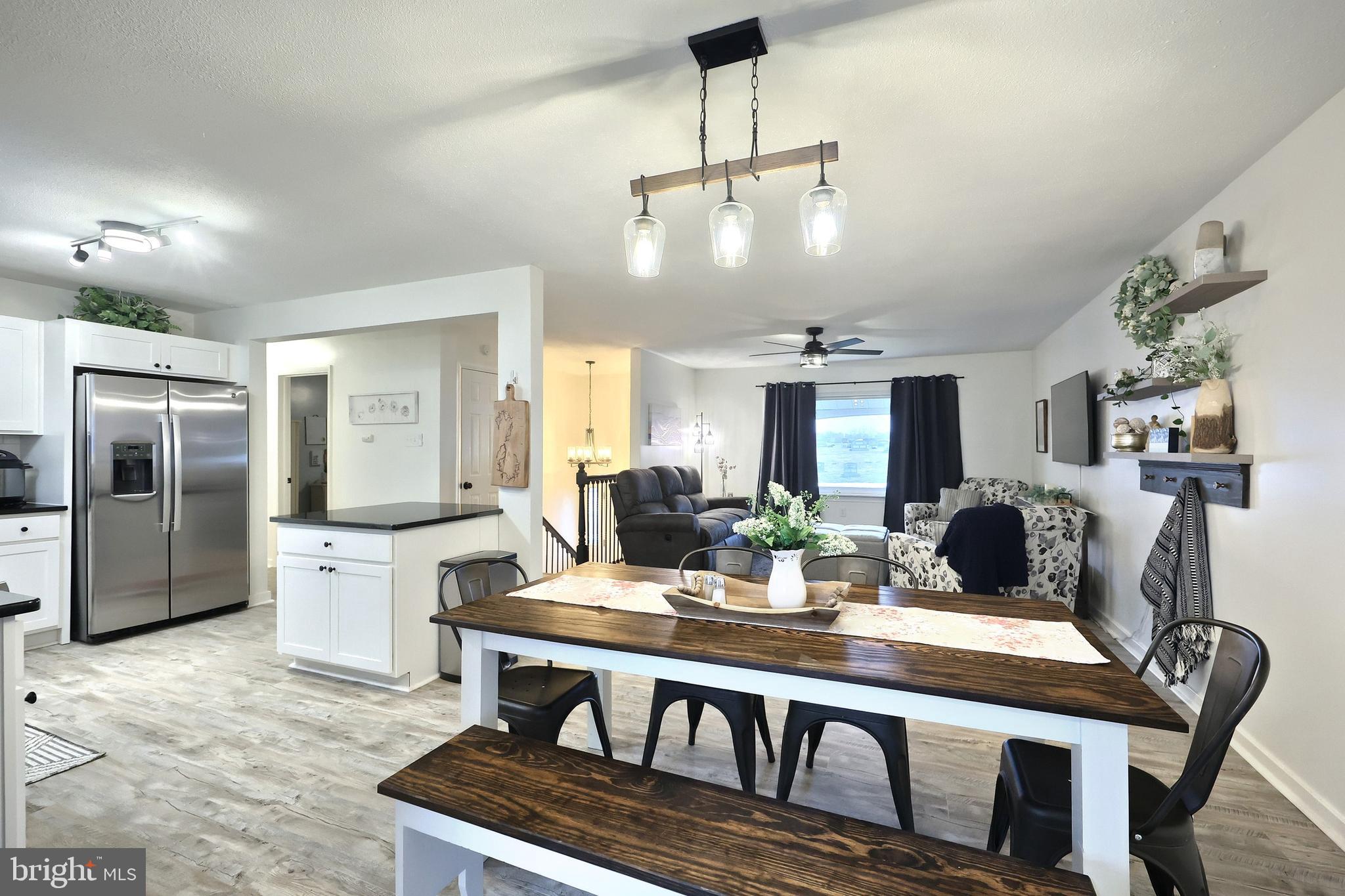 56 York Road York, PA 17407 - Photo 12 of 45 a view of a dining room with furniture window and wooden floor