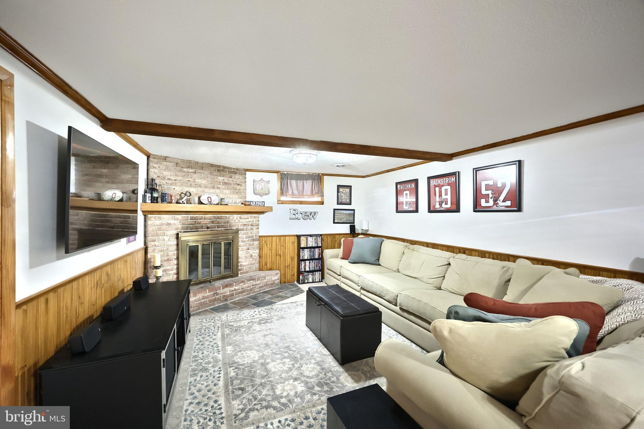 56 York Road York, PA 17407 - Photo 22 of 45 a living room with furniture and a flat screen tv