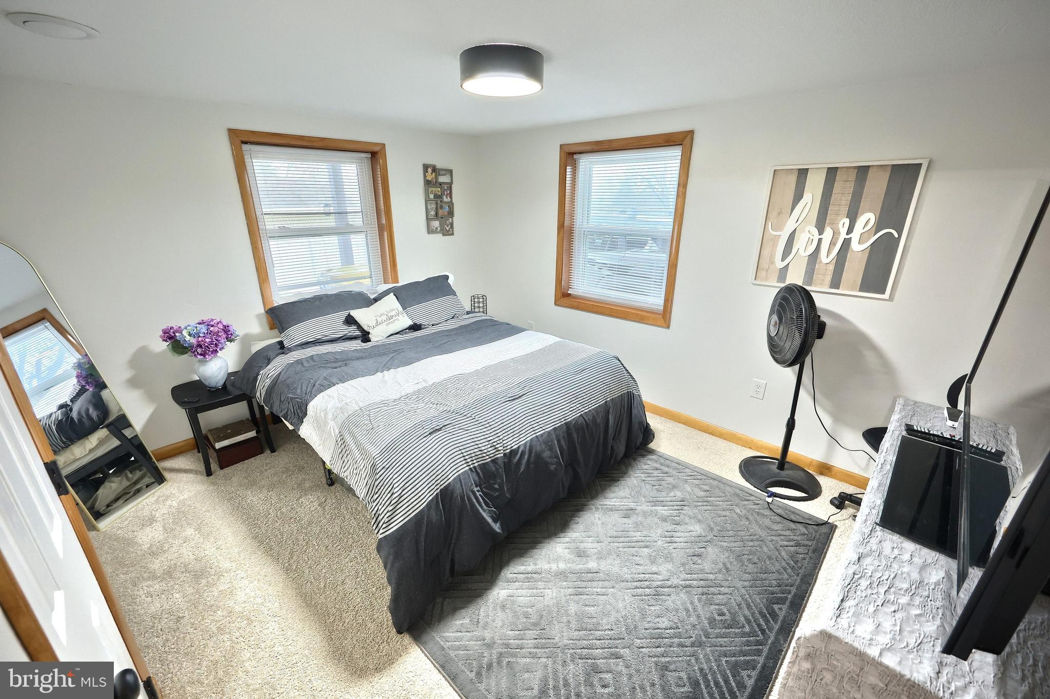 56 York Road York, PA 17407 - Photo 25 of 45 a bedroom with a bed and wooden floor