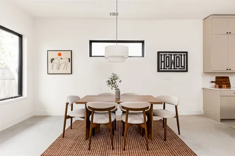 a view of a livingroom with furniture and window