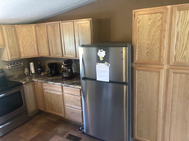 450 Sims Spring Road Shelbyville, TN 37160 - Photo 7 of 29 Open kitchen with stainless appliances