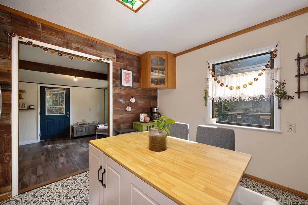 128 Main Street Gold Run, CA 95717 - Photo 14 of 44 a bathroom with a sink a vanity and mirror