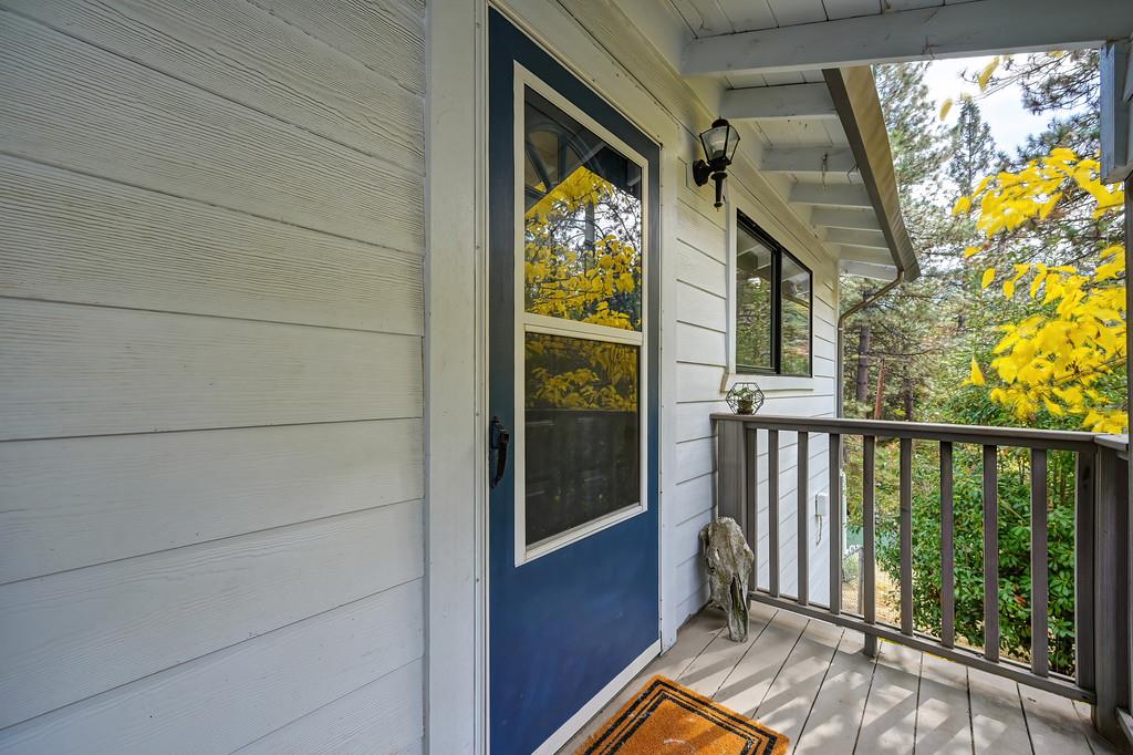 128 Main Street Gold Run, CA 95717 - Photo 2 of 44 a view of balcony with wooden floor