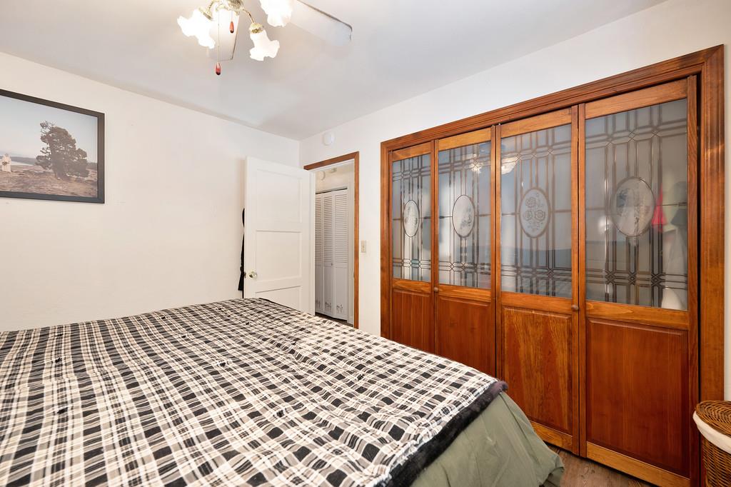 128 Main Street Gold Run, CA 95717 - Photo 21 of 44 a bedroom with a bed and a window