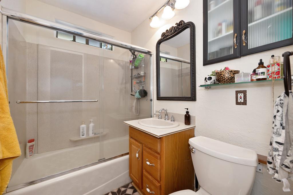 128 Main Street Gold Run, CA 95717 - Photo 22 of 44 a bathroom with a sink a toilet and shower