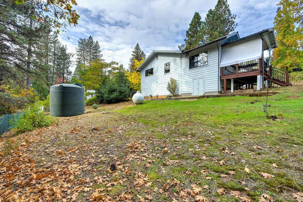 128 Main Street Gold Run, CA 95717 - Photo 29 of 44 a view of a house with a yard