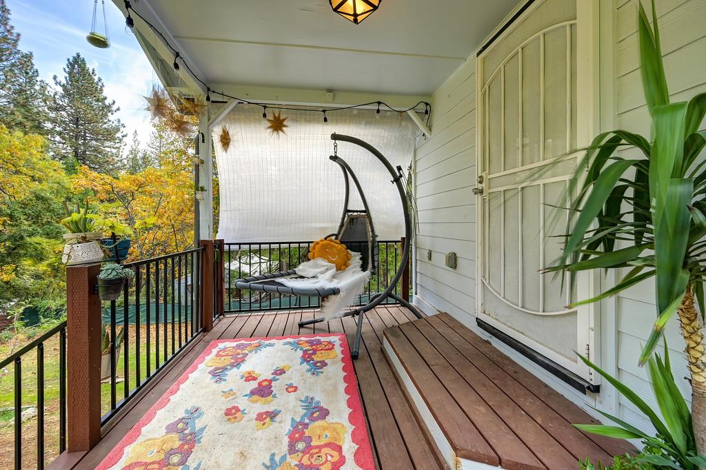 128 Main Street Gold Run, CA 95717 - Photo 31 of 44 a balcony with view of wooden floor