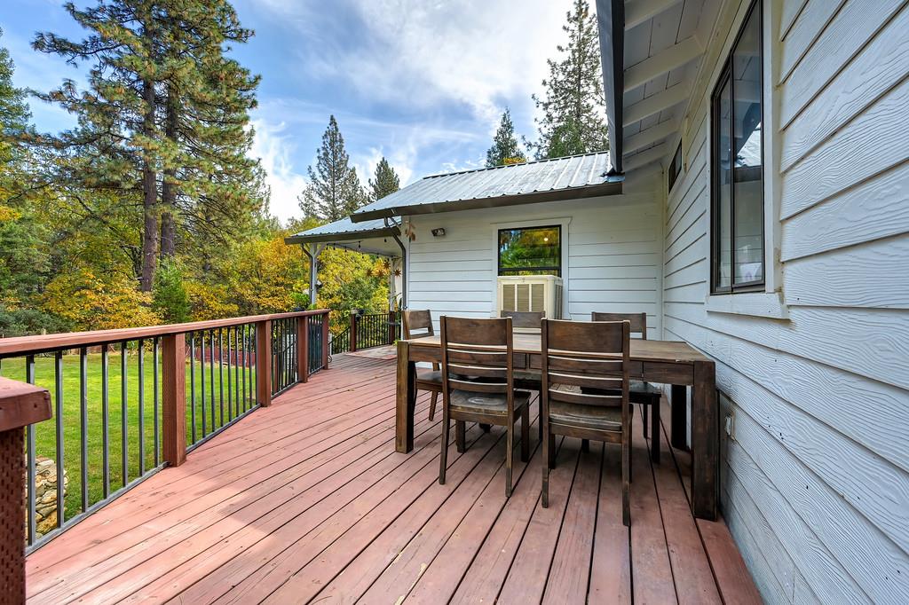128 Main Street Gold Run, CA 95717 - Photo 33 of 44 a view of a deck patio and outdoor seating