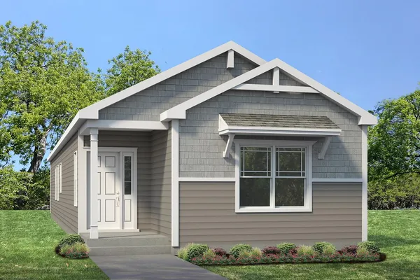 a view of a house with yard and plants